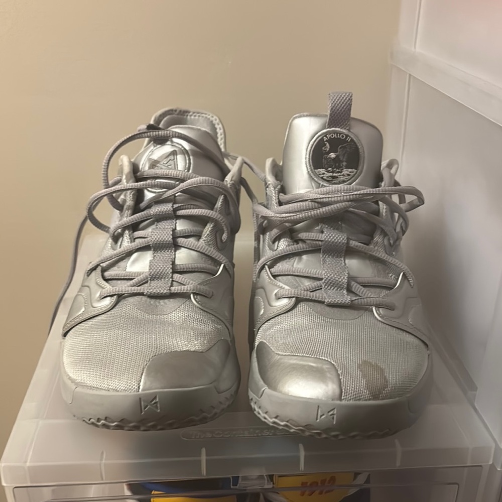 Nike Silver Athletic Shoes with Supportive Sole